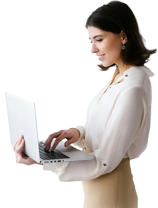 Professional reviewing work on a laptop